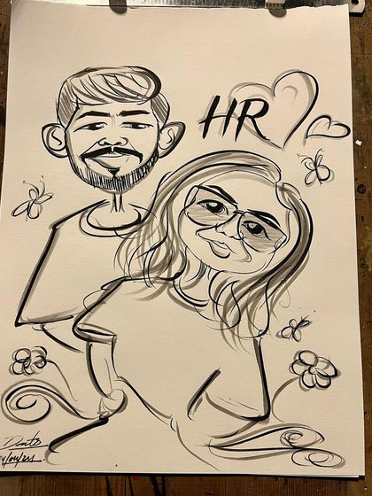 A sweet couple's portrait, personalized with their initials. These custom touches make for a great anniversary or wedding gift.