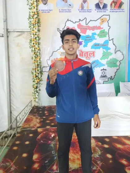 A proud Md. Asif with his Bronze medal from the SGFI Nationals.