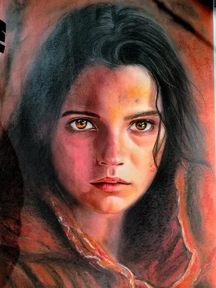 This portrait of a young girl was my first attempt with soft pastels. It was a challenging but rewarding process to capture the innocence in her eyes.