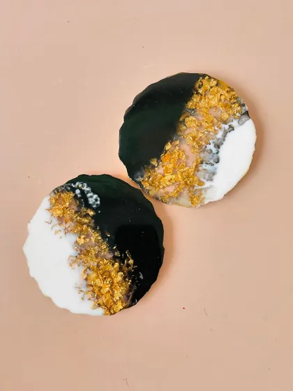 A close-up of the stunning gold-infused resin coasters that I include in some of my premium hampers.