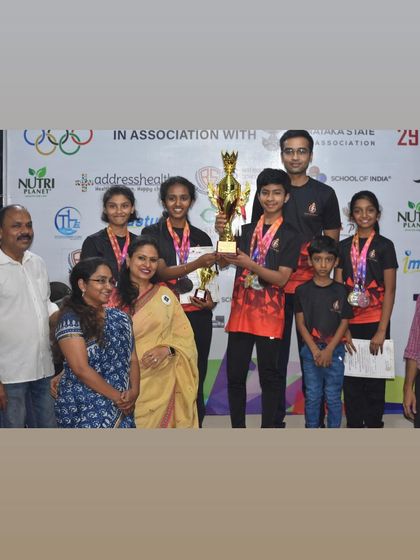 The winning team from the Best Shot Open Competition rifle event, celebrating with our honored guests.