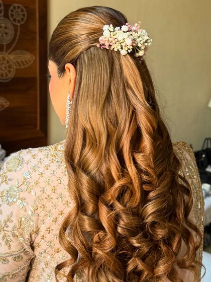 Another angle of the soft glam floral hairstyle, a perfect look for an engagement or day wedding.