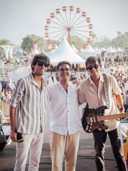 The three of us on the Zomaland stage. We're not just bandmates, we're great friends, and that connection comes through in our live performances.