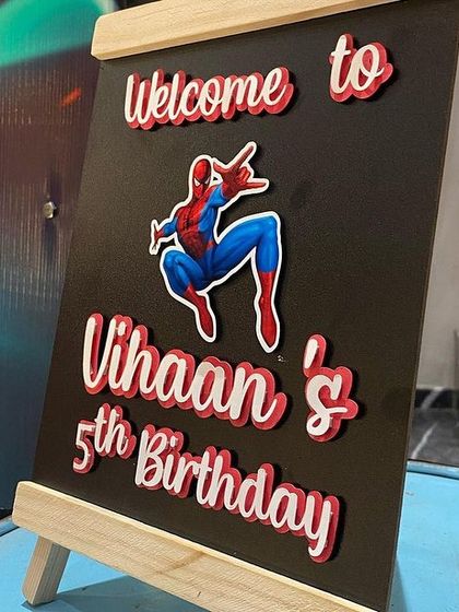 A personalized welcome easel for the Spider-Man party, featuring 3D lettering and the iconic superhero.