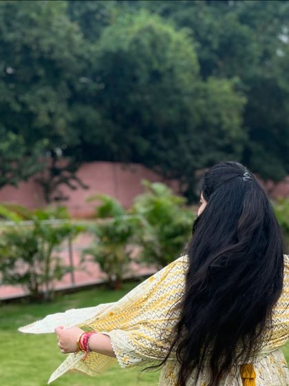A candid shot showing the movement of my hair and outfit. Dance is about embracing your natural flow and energy.