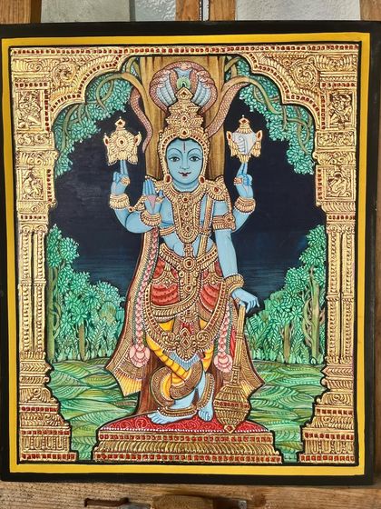 This exquisite 10x12 inch Mysore painting of Lord Vishnu under the serpent Adishesha is crafted with intricate detailing. Though small in size, it is grand in artistry and devotion.