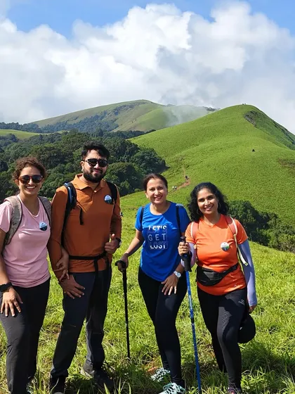 A small group of trekkers with their gear, ready to conquer the Bandeje trail.