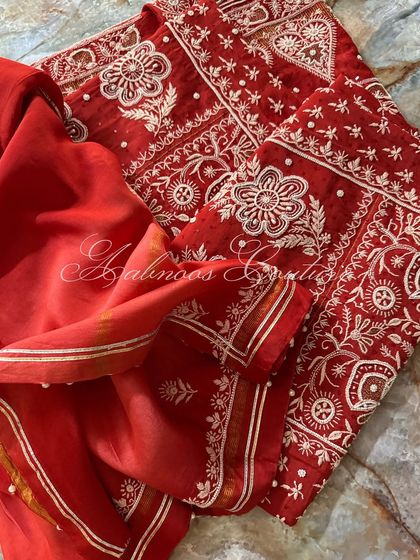 This image shows the kurta and dupatta laid together, demonstrating the cohesive design.