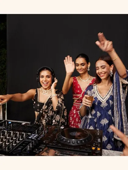 DJ beats and killer moves. The bride squad taking over the console and the dance floor.