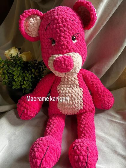 A full view of our handmade Pink Panther toy. Its long limbs and expressive face are crafted with care to capture the character's charm.