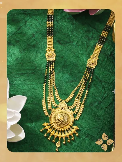 Celebrate love and tradition with this multi-string gold mangalsutra. The classic design with a circular pendant is perfect for the modern woman who cherishes her roots.