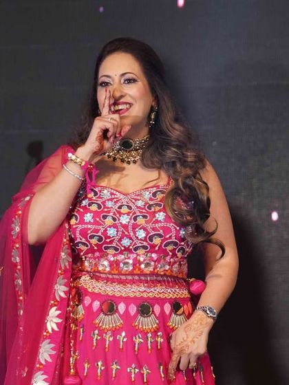 A close-up of a family member enjoying her performance. The smiles on their faces are the best reward for our hard work.