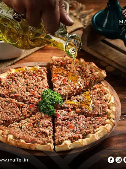 For a heartier option, we offer our Minced Lamb Manakeesh. The rich, savory lamb is spread over the flatbread and baked, then finished with a drizzle of olive oil.
