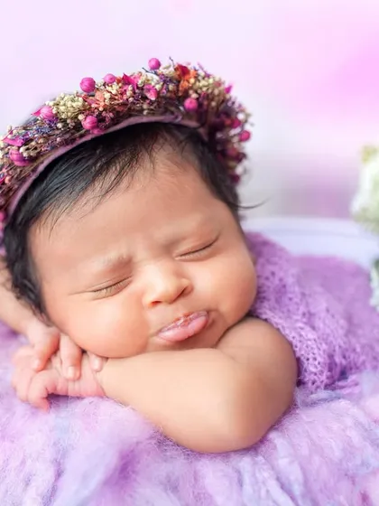 That little tongue sticking out is just the cutest. Even in their sleep, babies give us so many wonderful expressions to capture.