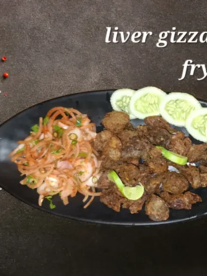 A popular starter, our deep-fried liver and gizzard. It's crispy on the outside, tender on the inside, and served with a fresh onion salad.