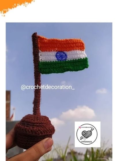 Our handmade crochet Indian flag, the Tiranga, mounted on a stand. It's a perfect decorative piece for your desk or car to show patriotic pride on national holidays.