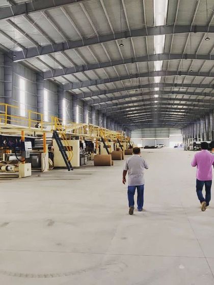 We also undertake large-scale industrial projects. This photo shows the vast interior of a manufacturing facility during its final stages of setup, a space designed for efficiency, scale, and workflow optimization.
