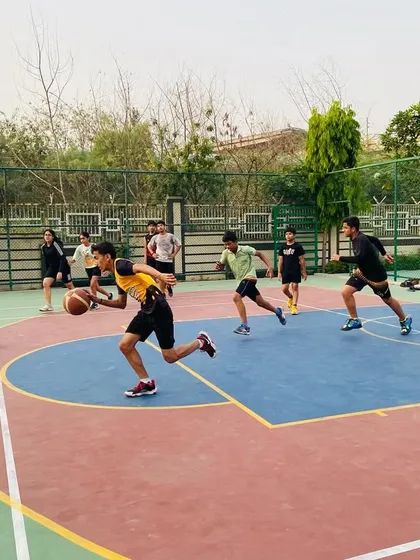 A fast break in action. See the speed and coordination as our players push the ball up the court.