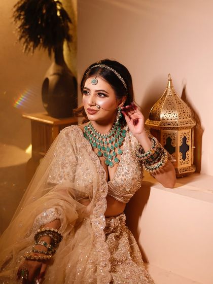 An elegant and ethnic look. The soft lighting and traditional jewelry create a timeless portrait.