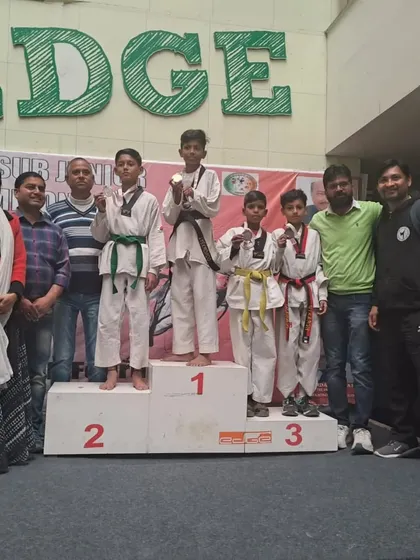 The podium for the under 27kg category at the 38th Sub Junior Delhi State Taekwondo Championship, with my student Utkarsh Chopra in the bronze medal position.