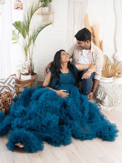 Capturing the happy and relaxed connection between a couple is what I love most. This candid moment in our boho lifestyle set shows the joy of their pregnancy journey.