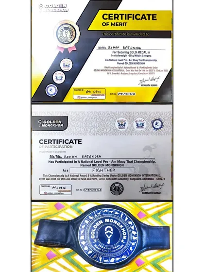 The spoils of victory. The certificates of merit and the championship belt from a national Muay Thai tournament.