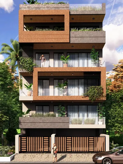 A residential building design that uses a large, offset brown frame to create visual interest and define the balcony spaces.