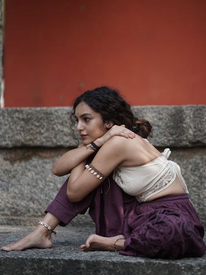 A contemplative pose that reflects both vulnerability and strength. My journey is about embracing all aspects of my being and soaring in my feminine energy.