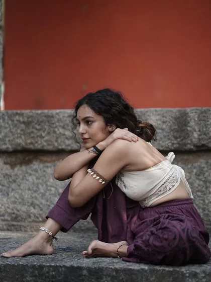 A contemplative pose that reflects both vulnerability and strength. My journey is about embracing all aspects of my being and soaring in my feminine energy.