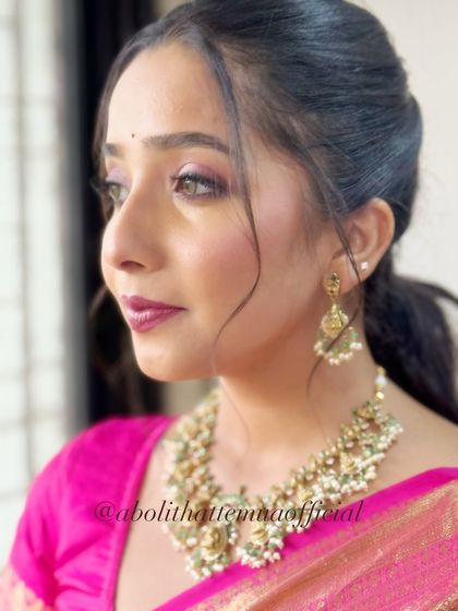 A close-up of the eye makeup for this awards night look, featuring a beautiful blend of pink and purple hues.