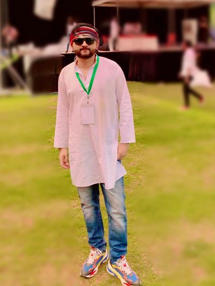 A photo of me at a Holi event, ready to get on stage. I always dress for the occasion and get into the festive spirit with the crowd.