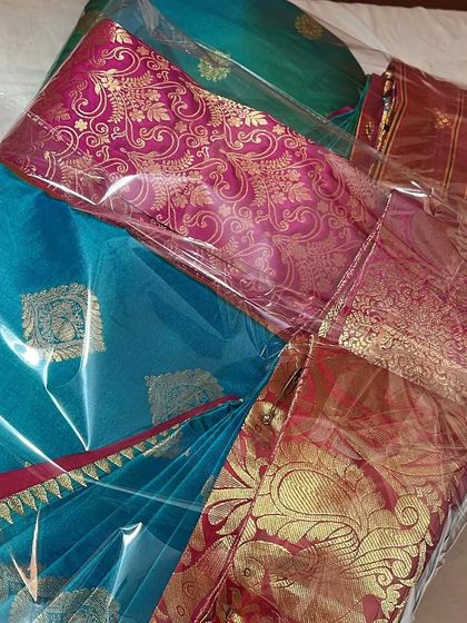 More packed sarees ready to go. I ensure each one is perfectly folded and protected.