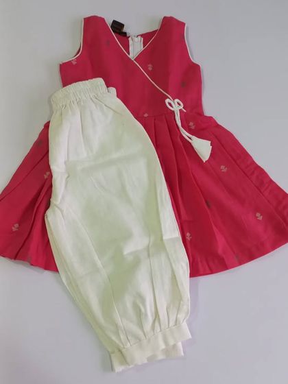 The complete Abhirami set in pink. The soft cotton top and matching ankle-length pants are designed for comfort and style, perfect for a long day of festivities.