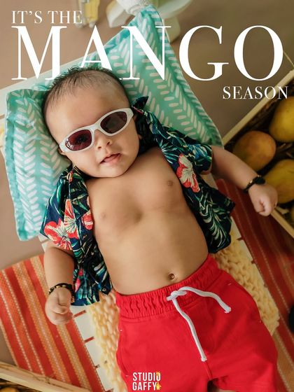 "It's the Mango Season!" A cool and cute portrait of a baby ready for summer.