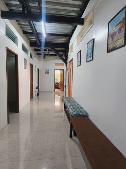 Our waiting area provides a comfortable space to relax before class. We've included a small library with inspirational books to help you center your mind.