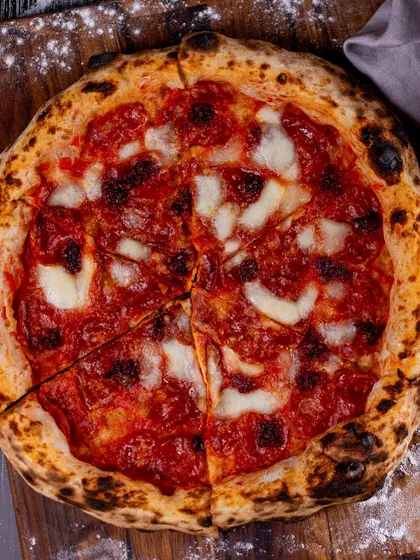A delicious Nduja pizza, available for delivery in Gurgaon.