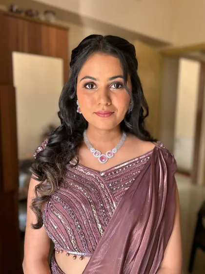 A full-face portrait showing her complete look.