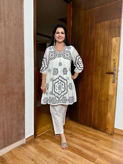 This white embroidered peplum kurti and pant set is another favorite from my March looks. It's comfortable, chic, and so easy to style.
