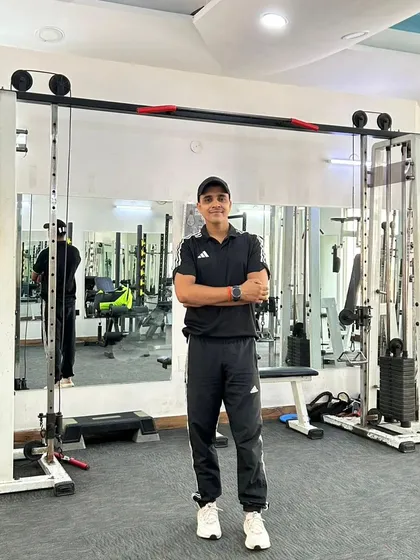 Standing ready in the gym, my primary place of work and passion.
