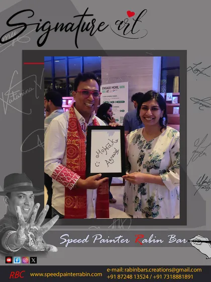 A client proudly displays her name written on a blank canvas, soon to be transformed into a unique piece of signature art.