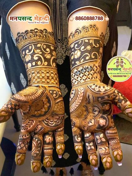 A gorgeous full-hand design with a mix of floral and traditional Indian patterns. The dark stain highlights the intricate details and shading.