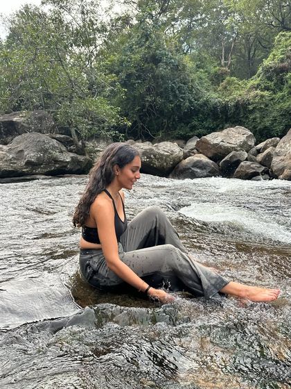 Finding pure joy in the cool, flowing water of a stream. Connecting with the elements is a powerful way to cleanse our energy and feel truly alive.