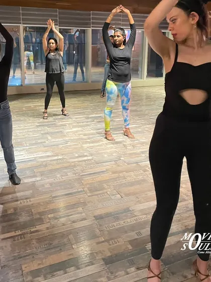 The ladies of the workshop practicing their styling and posture.