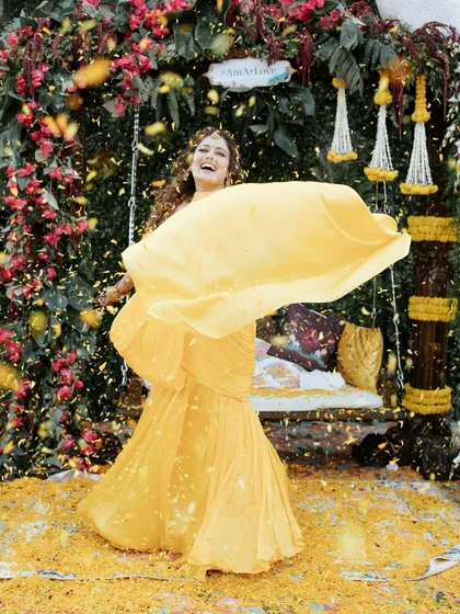The pure, uninhibited joy of a Haldi ceremony! We love creating vibrant, colourful spaces where brides can just be themselves, laugh out loud, and twirl in a shower of marigolds. This is happiness in a single frame. 💛