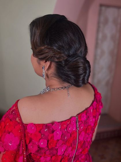 A side view of the twisted updo, highlighting its volume and sophisticated structure.