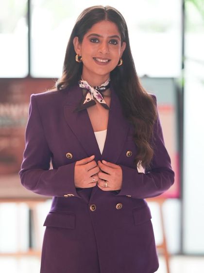 A close-up of my professional look for the Shiprocket summit. The purple pantsuit felt bold and confident, perfect for a leadership event.