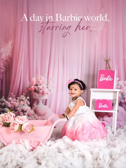 Welcome to a Barbie world, where dreams are dressed in pink! This themed photoshoot is perfect for your little princess, with a dreamy backdrop of flowers and clouds to make her feel like the star of her own fairytale.