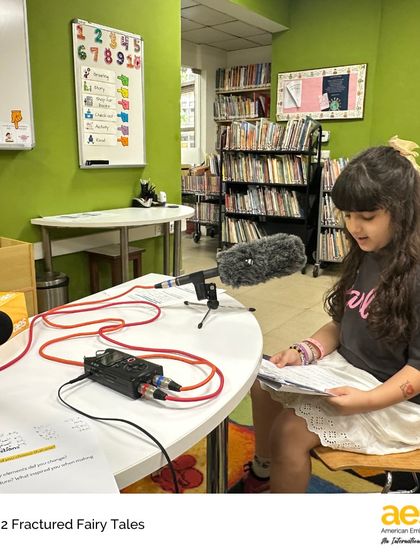 In our library-turned-recording-studio, a young author shares her imaginative twist on a classic fairytale. This project helps students develop their writing, public speaking, and digital literacy skills.