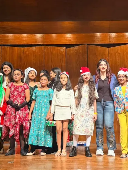 A group photo with the cast of our holiday show, celebrating a successful and joyful performance.