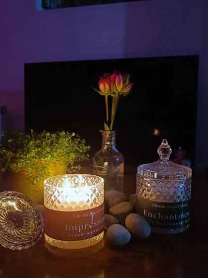 Another beautiful shot from a customer's Valentine's celebration. The 'Impressions' candle is lit, casting a warm glow and adding a unique scent to their special evening.